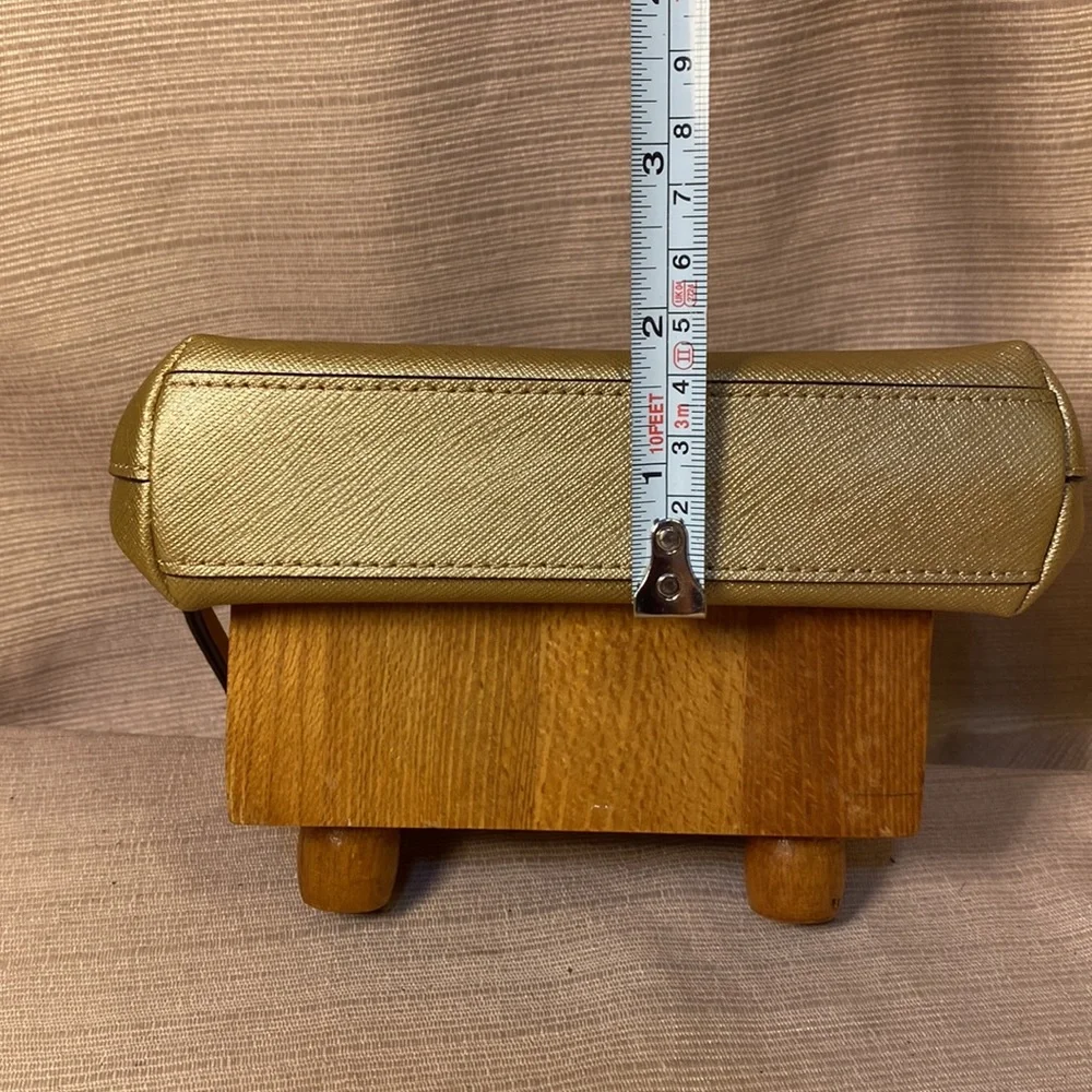 Coach gold metallic color cosmetic pouch w/elegant bow